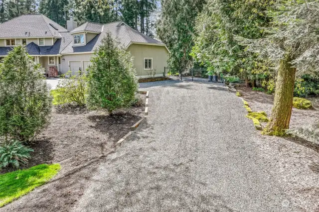 Large gravel driveway next to home is ready for RV and Boat parking.