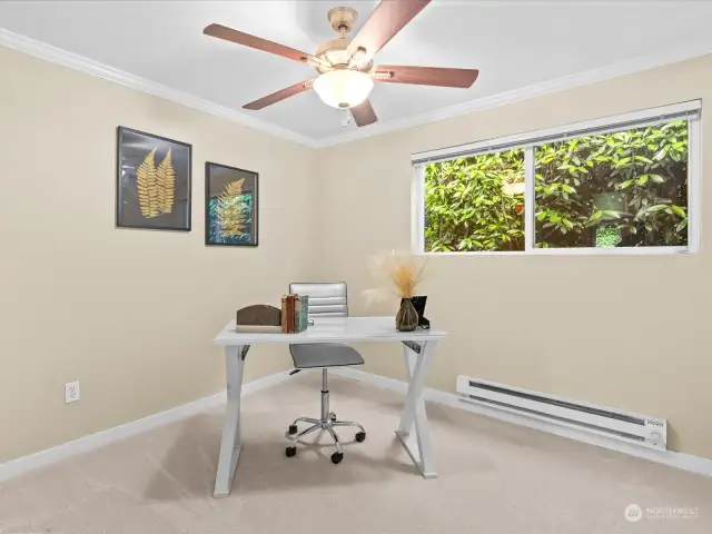 Second bedroom with overhead light and ceiling fan