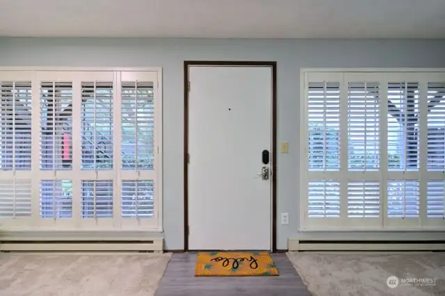 Custom plantation shutters provide both privacy & natural light.