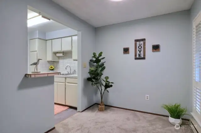 Kitchen opens up to the perfect dining area.