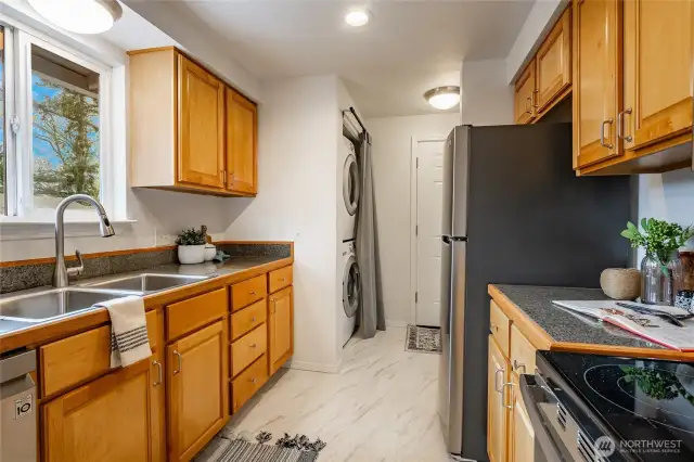 Wonderful kitchen with new stove, microwave and flooring