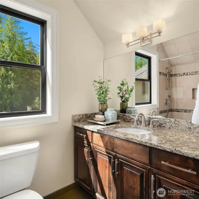 Bathroom adjacent to rec room  and bedroom.