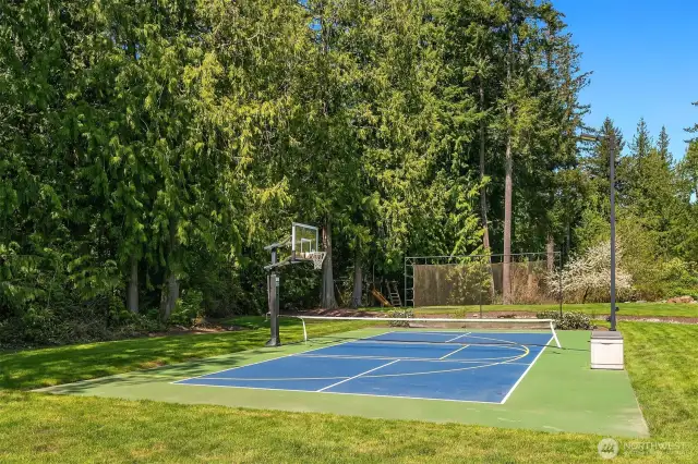Athletic court, batting cage, raised gardens, swing set, in ground trampolikne.
