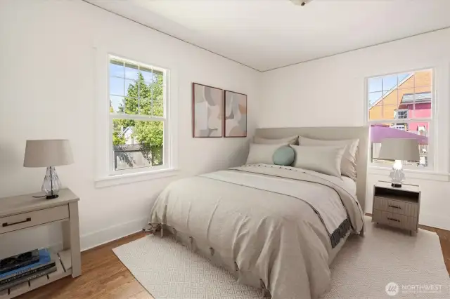 Main floor bedroom, newly refinished beautiful hardwood floors.
