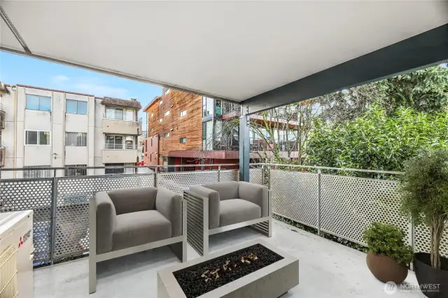 Slider to large outdoor Covered Balcony  City views to the Southwest  Gas/propane BBQs allowed.  Virtually Staged