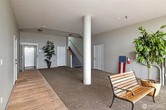 Gated entry area giving access to the elevator or stairs.