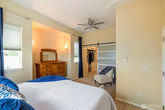 Primary bedroom, looking towards the closets and bath.