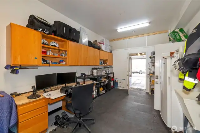 Back half of tandem garage converted into a hobby area.