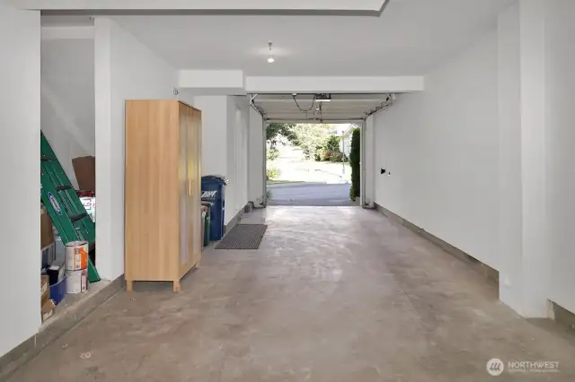 spacious garage with storage area, charging station