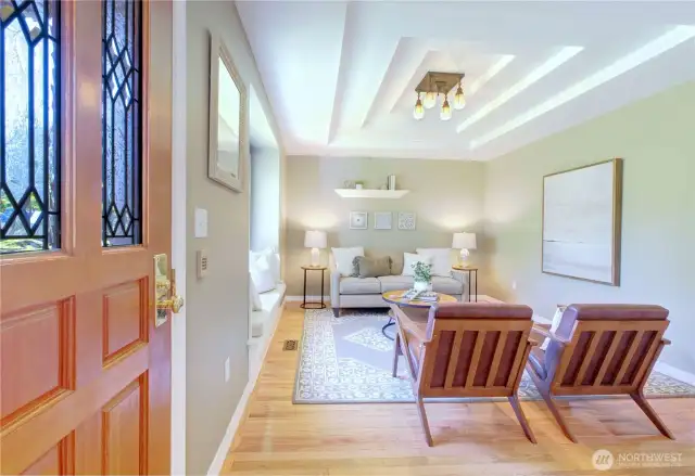 Living Room off the entry is away from the communal spaces for private conversations and solace.
