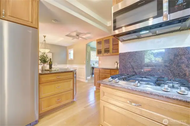 Seamless connection to the large Dining Room with walk-out to the Deck.