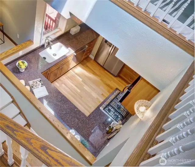 Looking over the stairwell from the catwalk and upstairs flex space.