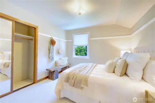 Second upstairs Bedroom.  Both upstairs Bedrooms enjoy the light filtered by leaves that turn golden in the fall.