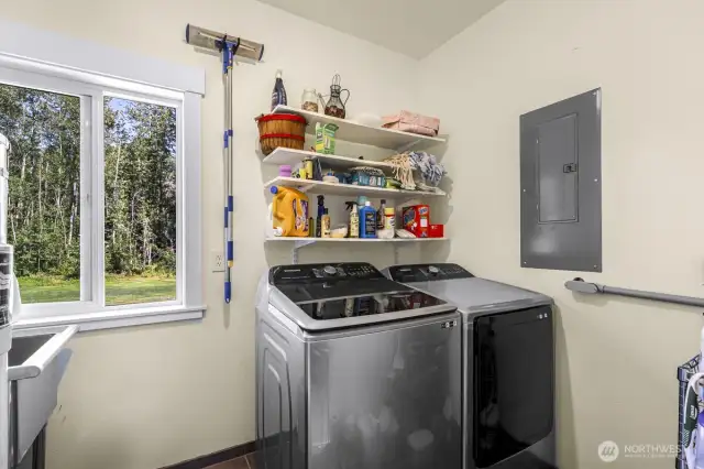 The utility room is adjacent to the garage
