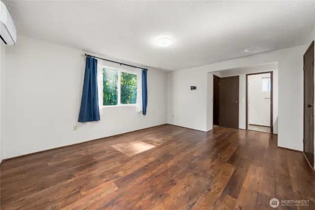 Primary with walk in closet and en-suite bath.