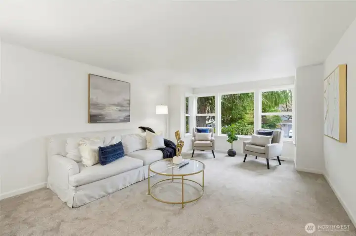 Formal living room just off the foyer is far enough away from the great room to invite private conversation even when the big game is on in the great room!