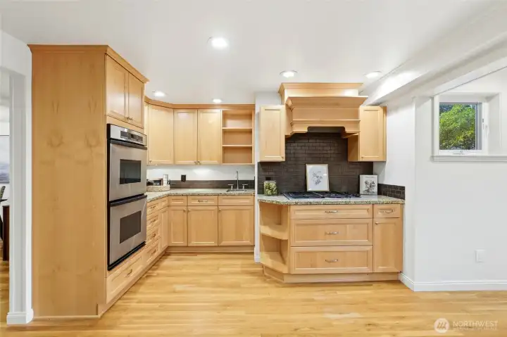 Kitchen has room for your helpers ~ prep sink is located between the double ovens and the gas range.