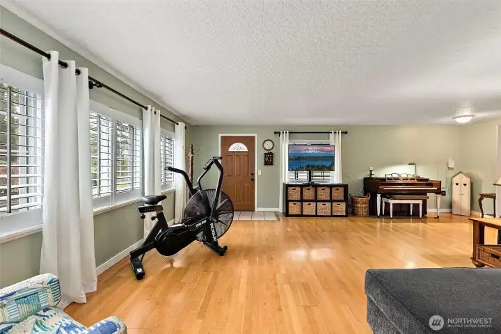 The door leads to the side of the house, adjacent to the detached garage.