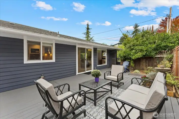 Picture yourself enjoying al-fresco summer meals on the sun-drenched deck, right off the kitchen slider.