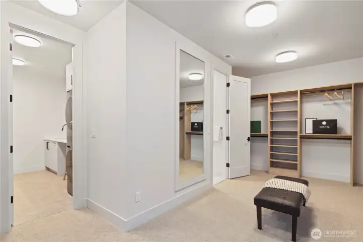 Primary closet wraps around to the laundry room.