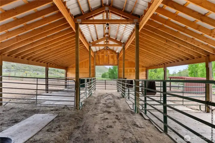 Barn is thoughtfully equipped with automatic waterers for year-round use and durable stall mats, creating a practical, low-maintenance setup for horses or livestock. Include tack area and covered hay storage.