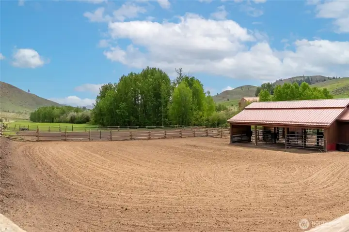 Paddock, arena, pasture, and barn set against open rolling hills—perfect for training, riding, and year-round horsing around.
