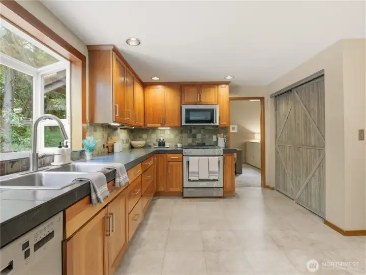 Updated kitchen with abundant cabinetry and workspace