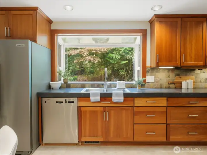 Kitchen with views of the private backyard
