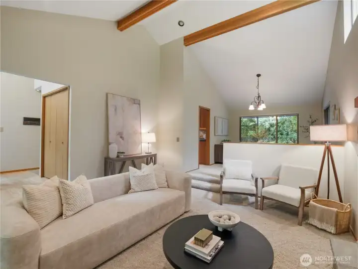 Vaulted ceilings and exposed beams throughout