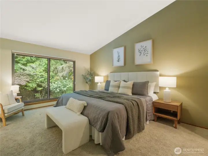 Primary suite overlooking the peaceful property