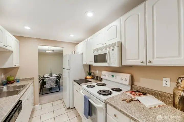 Kitchen includes all appliances - Dishwasher, range/oven, refrigerator, garbage disposal and built-in microwave.