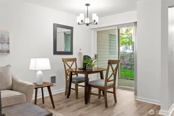 Bright sliding doors off dining area with patio space.