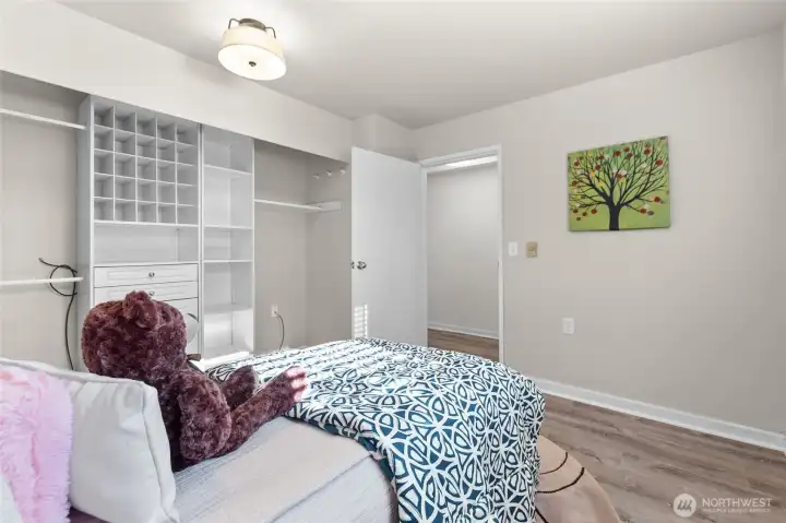 Second bedroom with large closets and built ins.