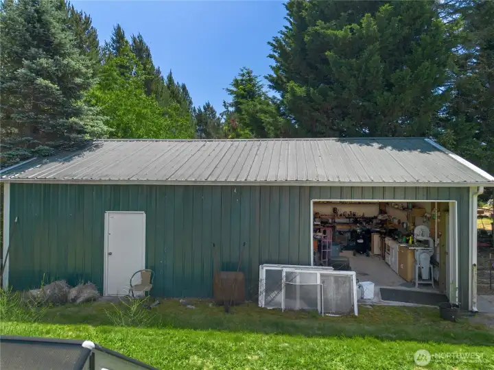 View of the shop, gate on the side allows you to drive right through.