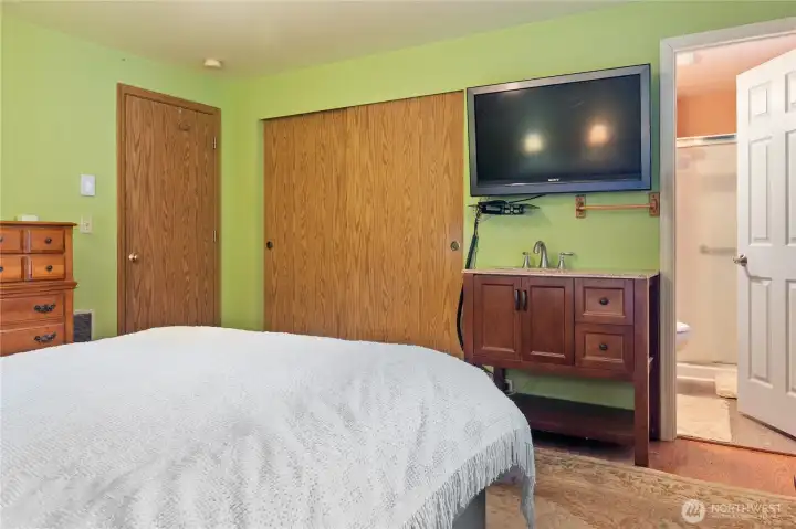 Primary suite.  Window looks to the backyard, nice and private.