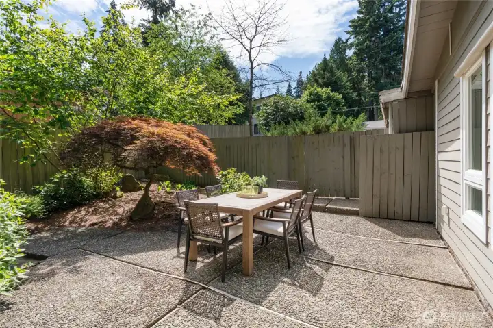 Spacious patio offers the perfect setting for summer gatherings and everyday enjoyment.