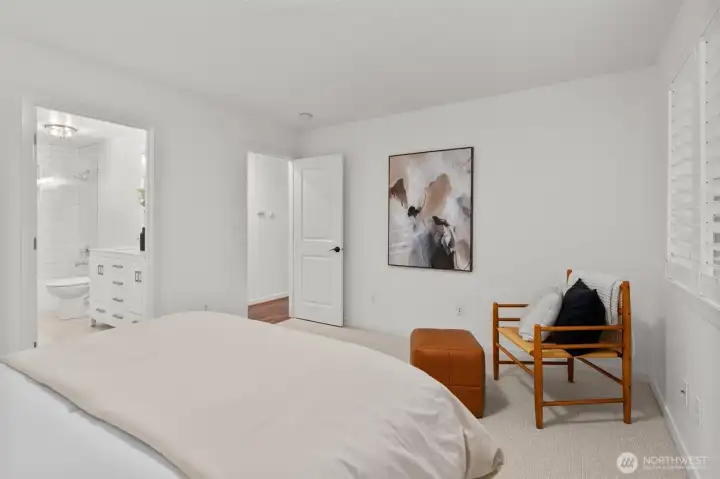 Generous main floor primary retreat offering comfort, space, and versatility.