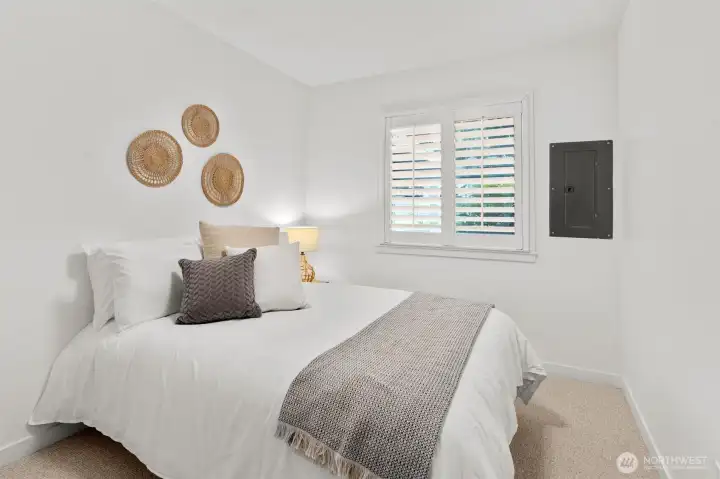Bright and inviting bedroom with ample natural light.