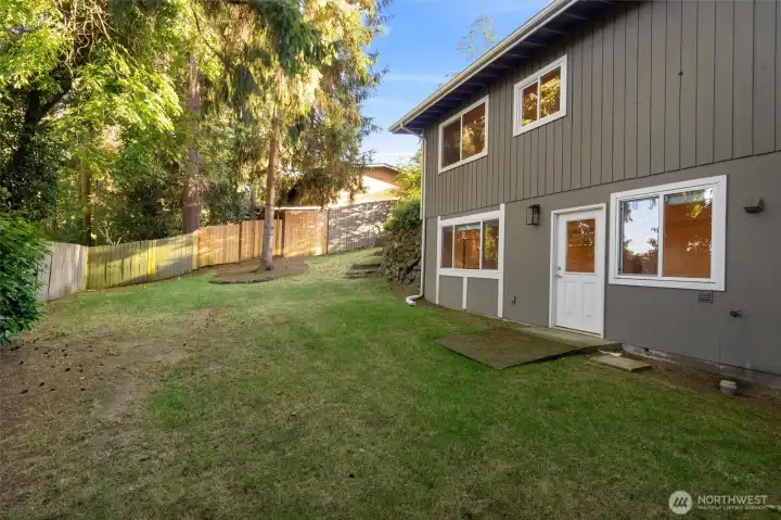 Seamless indoor-outdoor living with direct access to the backyard retreat.