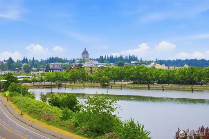 Wake up to iconic views of Budd Inlet and the Capital from your private balcony.