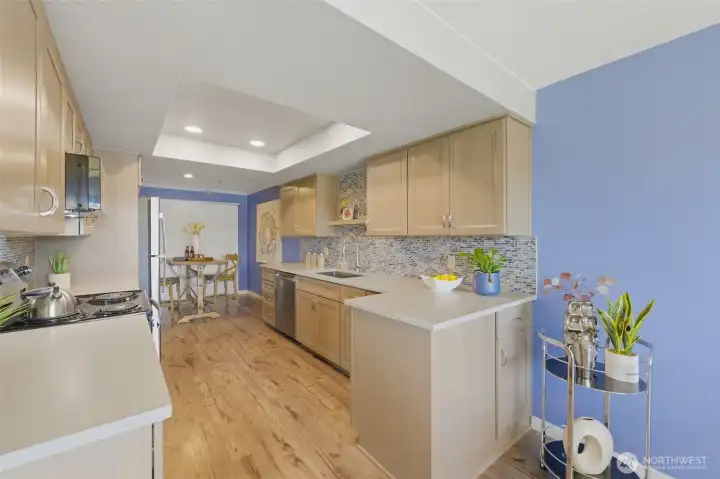 The kitchen was fully remodeled in 2024, and it’s a beautiful space with all new cabinetry, counters, backsplash, hardware, and new lighting.