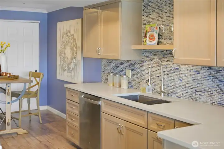 Beyond the kitchen, the nook makes a great casual dining area or home office.