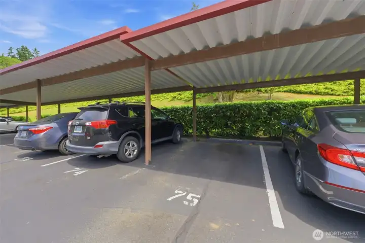 Parking Spot 75 is covered and located near the unit.