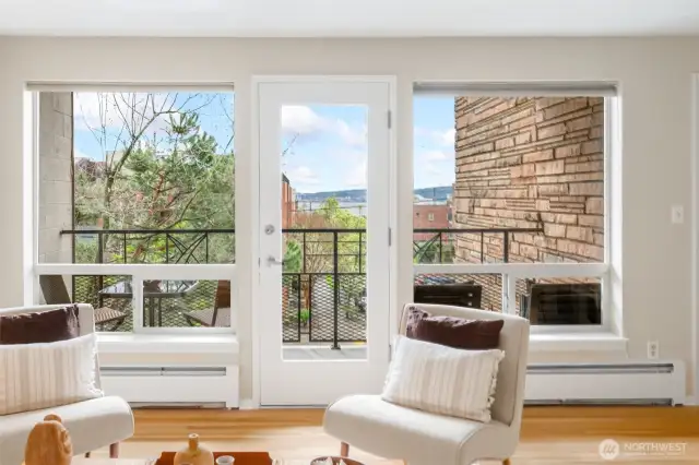 South facing, with deck. Tons of light and a view!