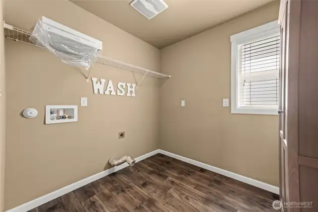 Untility room located upstairs.