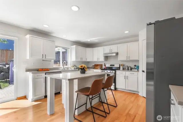 Kitchen with island that has seating area