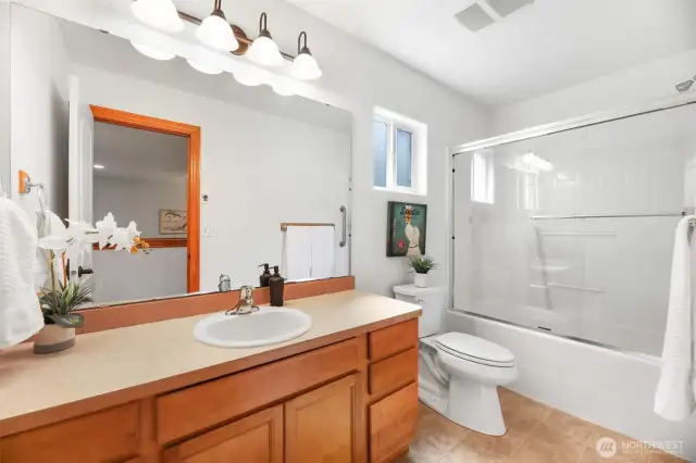 Upstairs bathroom with shower and tub