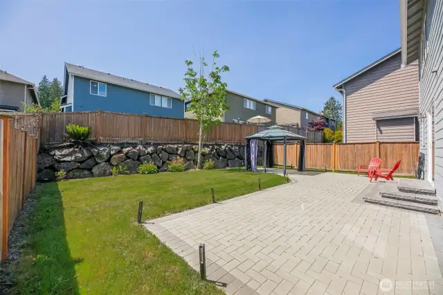 Backyard has great space for entertaining.
