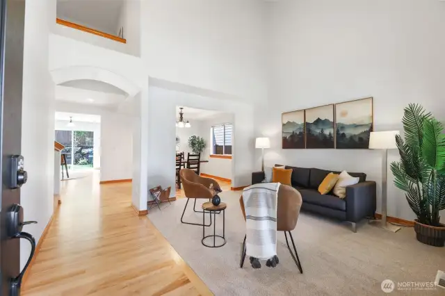 Walk into open space with living room and dining room