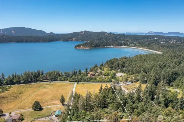 Rare opportunity to own acreage near town with infrastructure in place and no CC&Rs on Orcas Island.